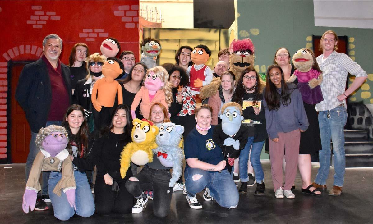 Performers at an Avenue Q rehearsal