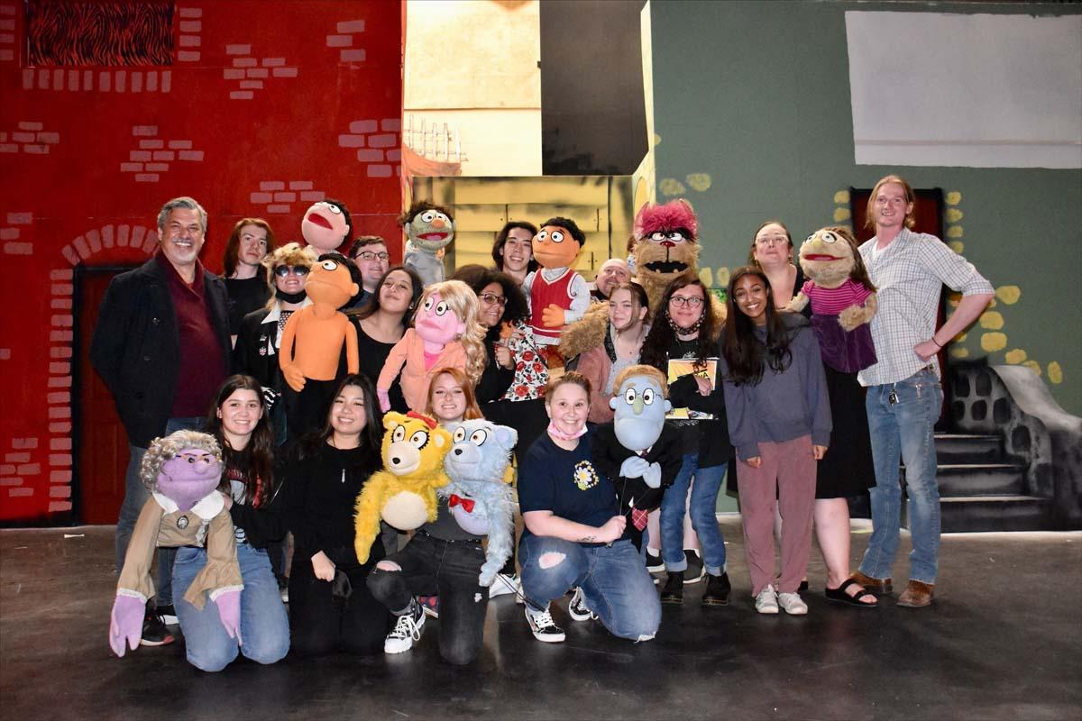 Performers at an Avenue Q rehearsal