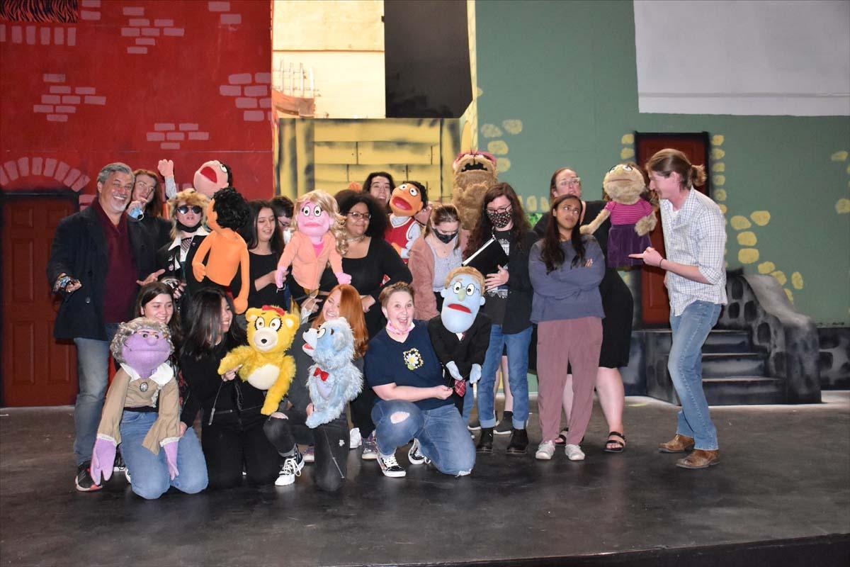 Performers at an Avenue Q rehearsal